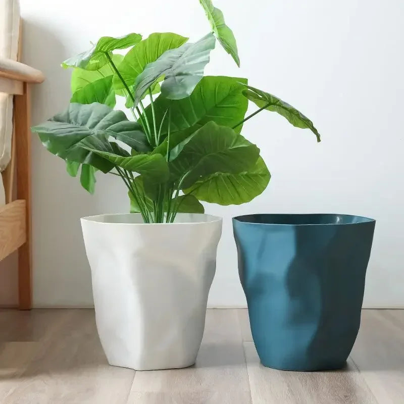 Poubelle ronde design irrégulier en plastique